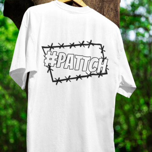 mockup-of-an-oversized-tee-hanging-from-a-tree-m39840